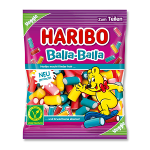 sachet de bonbon Haribo violet avec l'ours haribo qui fait coucou, et les balla balla dans le sachet