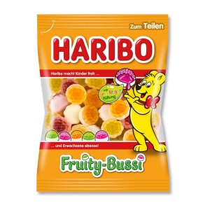 Sachet Haribo orange avec le nounours Haribo et mes bonbon gélifiés à l'intérieur