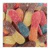 Vrac de langues acides haribo de couleurs rouge et orange, rose et bleu, et marron et jaune