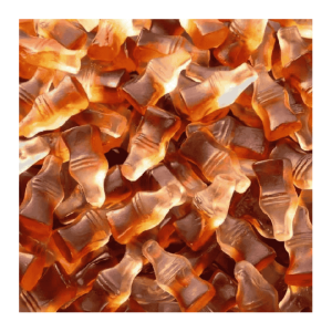Vrac de happy cola lisse de chez Haribo qui sont des bonbons gélifiés en forme de bouteille de cola