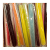 Vrac de sucre d'orge fluo qui sont des batônnets de sucre aux fruits exotiques