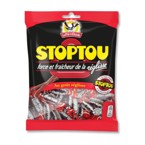 Sachet rouge, noir et jaune, qui sont des bonbon à la réglisse