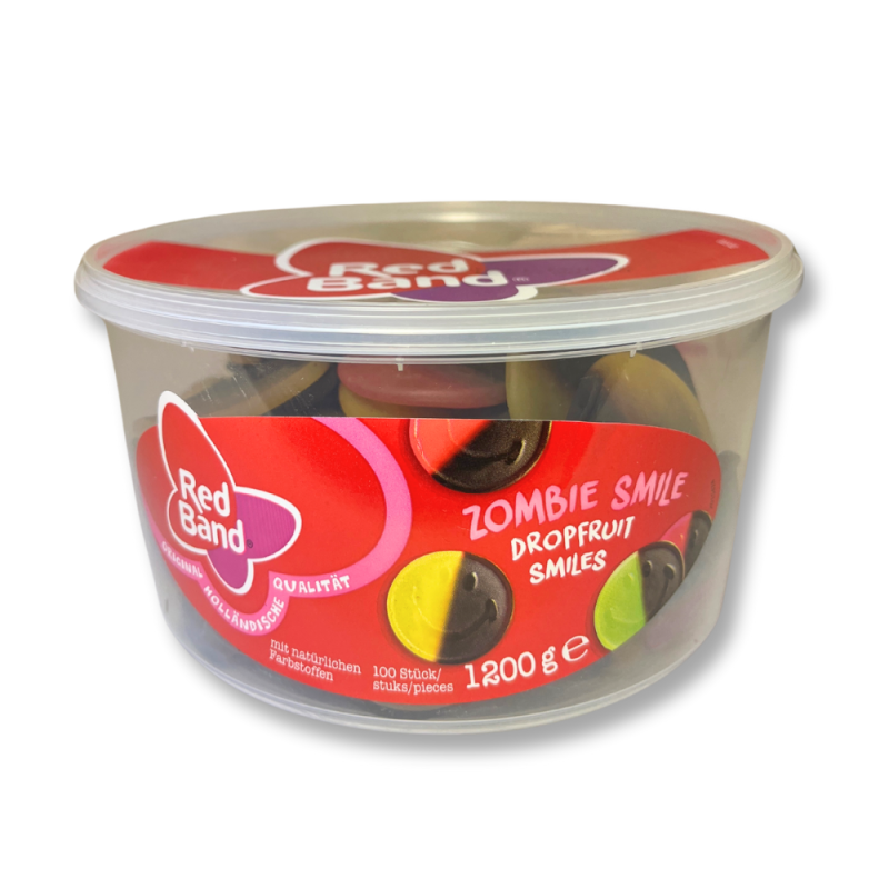 Boite tubo de sourire réglisse et fruits qui sont des bonbon moitié réglisse et fruits en forme de sourires