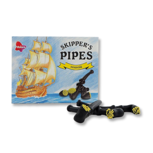 Pipe en réglisse avec des petites billes de sucres jaunes au bout