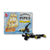 Pipe en réglisse avec des petites billes de sucres jaunes au bout